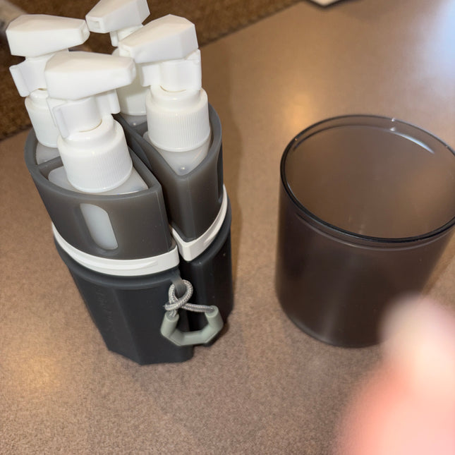 Four and one dispenser with suction cup