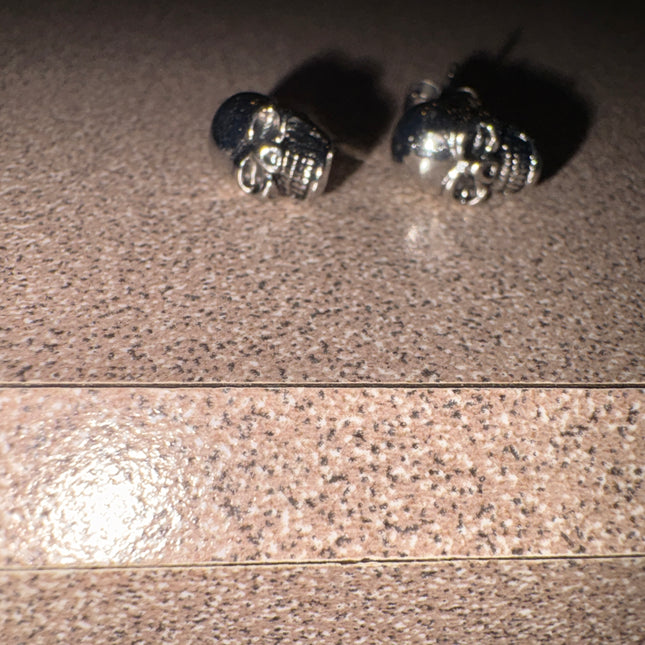 Silver skull earrings for pierced ears