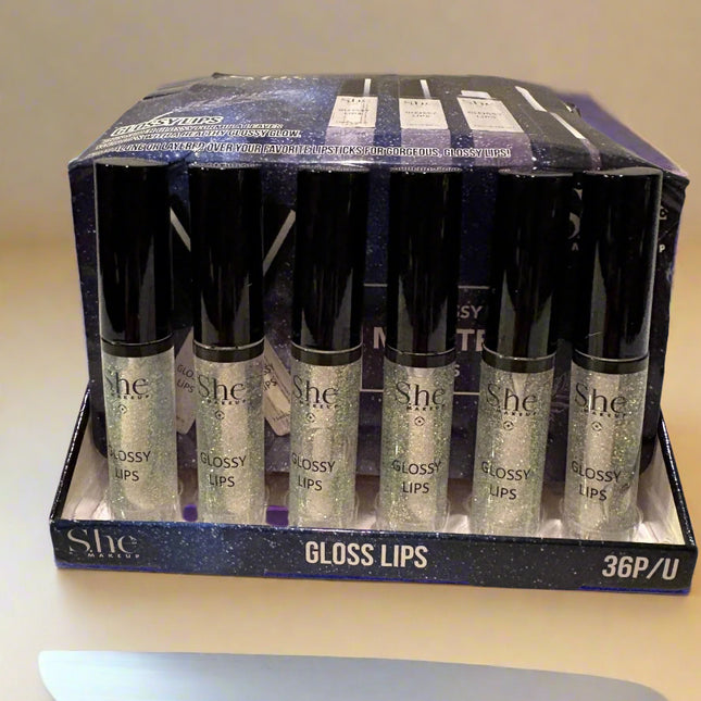 She clear glossy moisten lips - Tula Rose